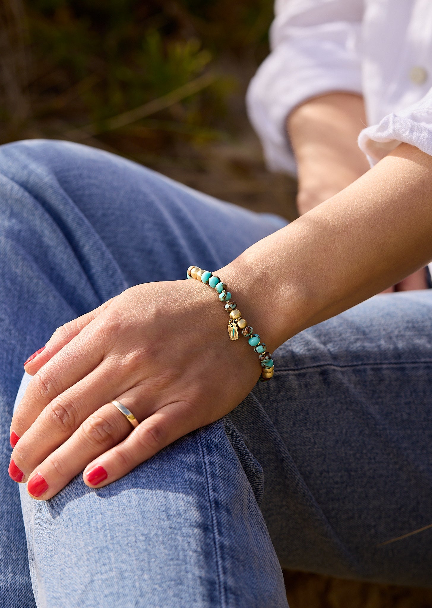 The chosen Bracelet teal gold1